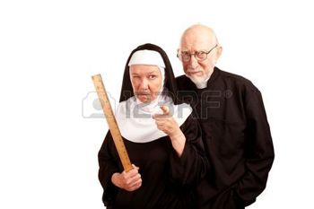 6459934-funny-priest-with-mean-nun-holding-ruler
